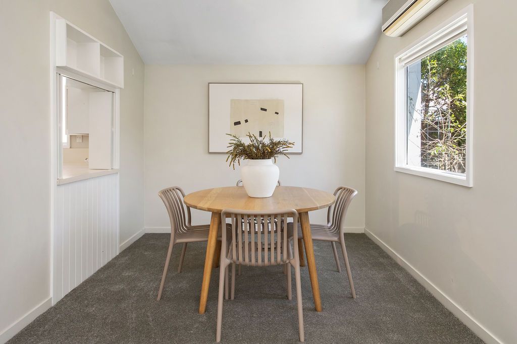 Dining before central Christchurch apartment renovation