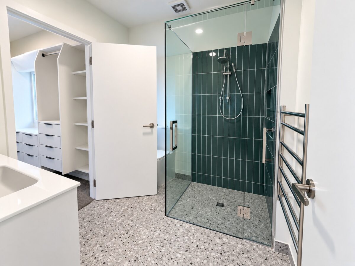 Tiled bathroom in completed central Christchurch townhouse renovation by Gareth Davis Builders