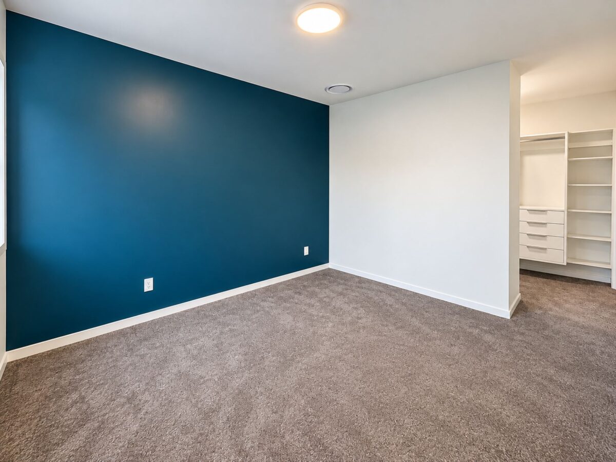 Master bedroom in completed central Christchurch townhouse renovation by Gareth Davis Builders