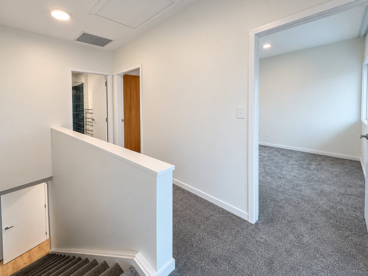 Refreshed landing area in central christchurch townhouse renovation