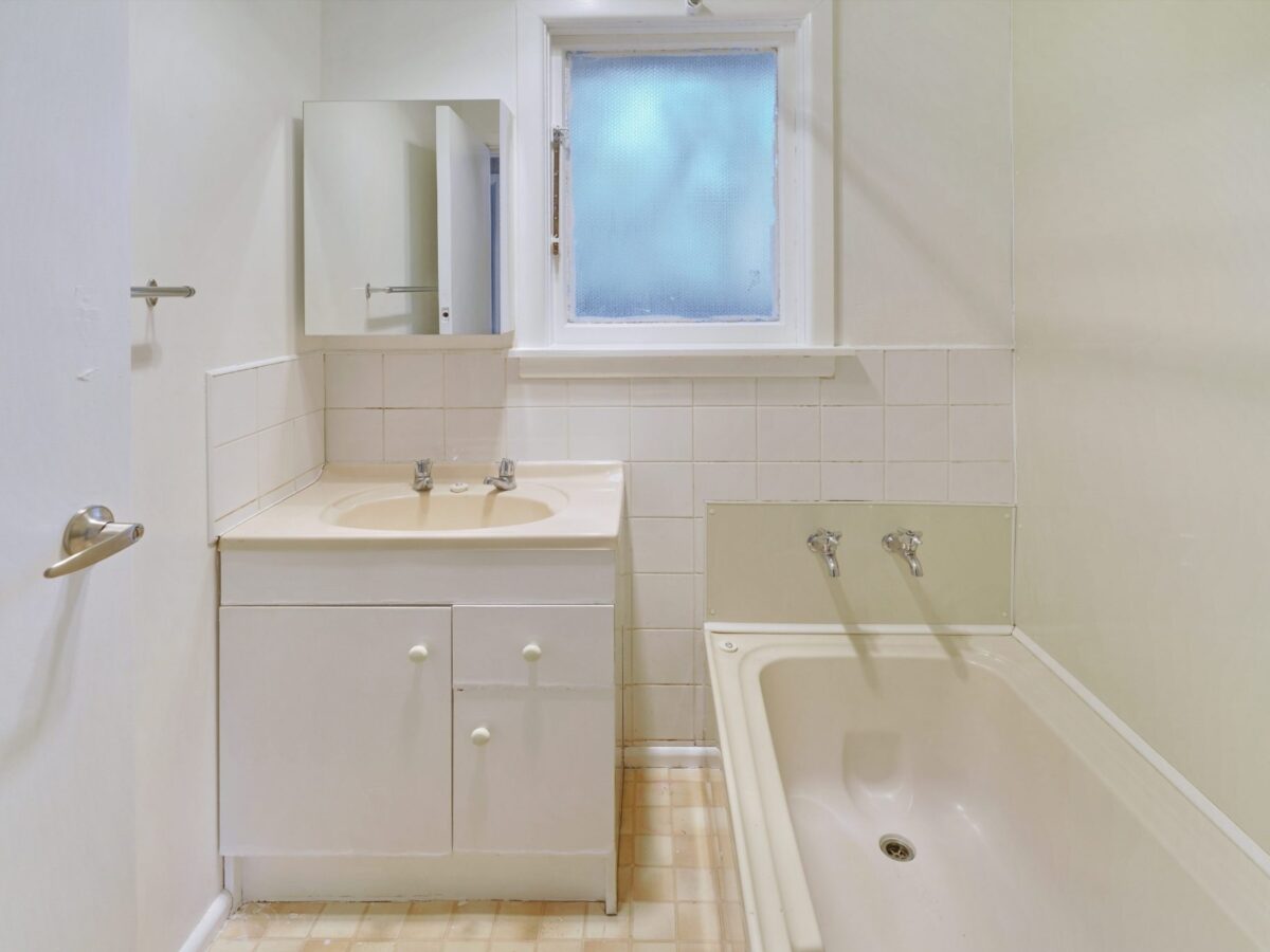 Bathroom before full home renovation in Rangiora