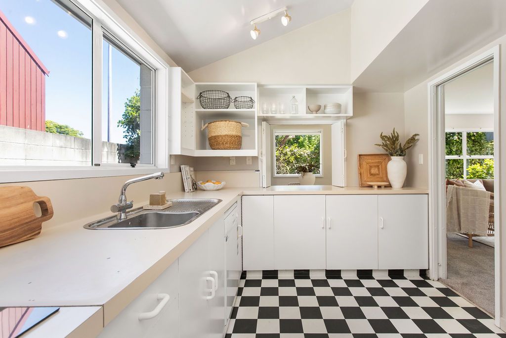 Original 1980s kitchen before central Christchurch apartment renovation
