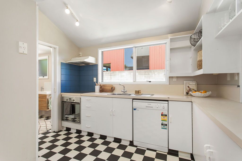 Kitchen before photo central Christchurch apartment renovation