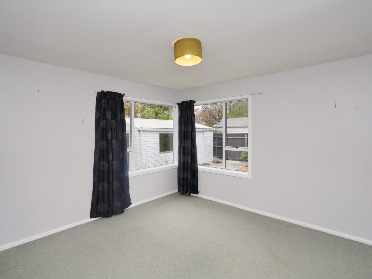 Master bedroom before full home renovation in Rangiora