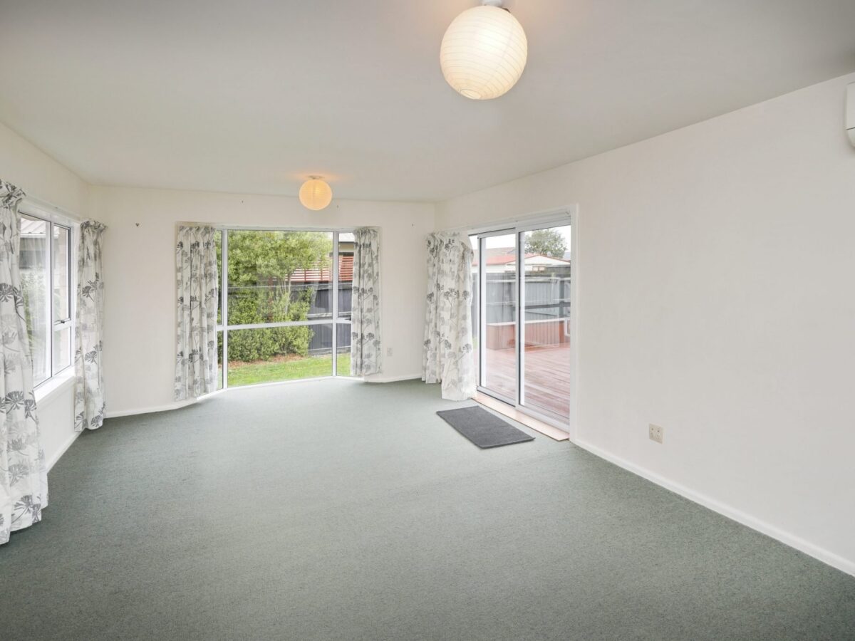 Living room before full home renovation in Rangiora